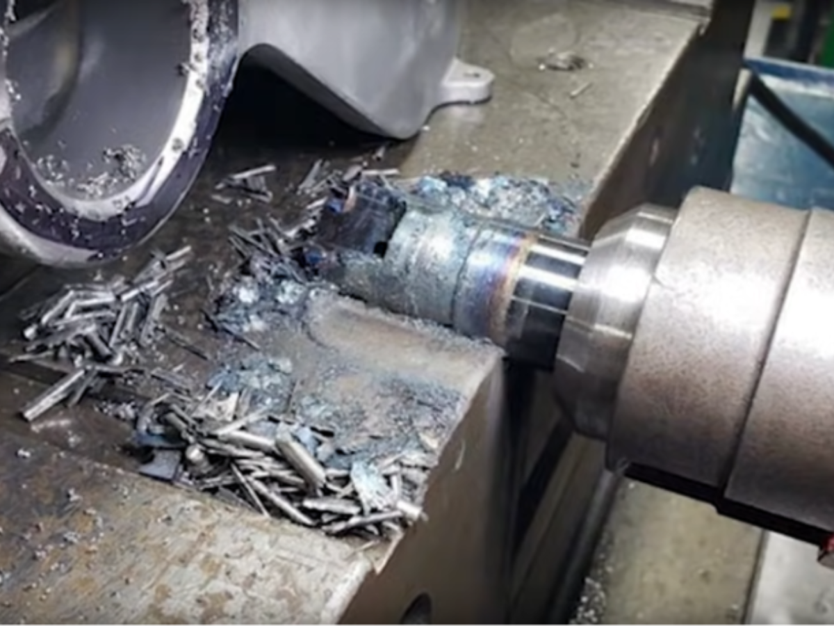 Significant CNC milling machine crash event involving machine spindle and cutting tool. 